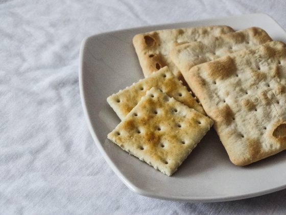 saltine crackers on a white plate